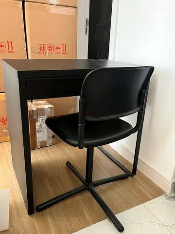 Simple black study desk with matching chair - good condition