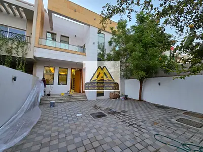 Luxury villa with 5 master bedrooms | Two spacious living rooms with a comfortable design | Fully equipped kitchen with a practical layout | Large cou
