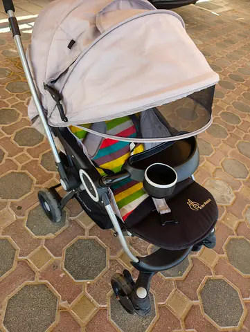 Lightweight standard baby stroller with canopy and cup holder