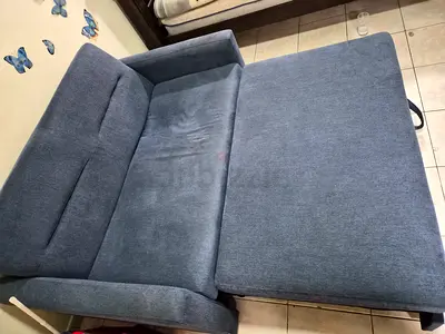 Blue convertible sofa bed - good condition
