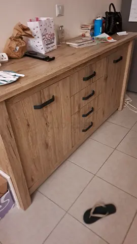 Wooden look storage cabinet with multiple drawers - good used condition side board.