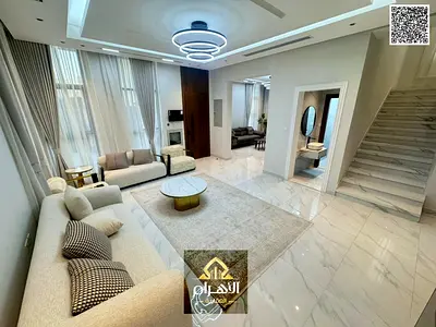 Villa for sale next to the mosque and near Sheikh Mohammed Bin Zayed Road, excellent finishing at an attractive price including registration fees and