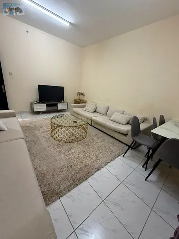 Furnished one bedroom apartment with a living room for rent in Al Rashidiya One located behind Ramada Hotel in a prime and lively area close to all