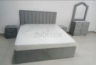 Modern Grey Upholstered Bedroom Set with Bedside Tables and Dresser