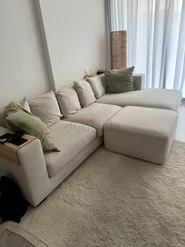 Beige L-shaped Sectional Sofa with Cushions and ottoman - only 7 months old.