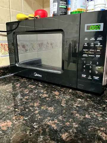 Used Midea Black Countertop Microwave - Good Working Condition