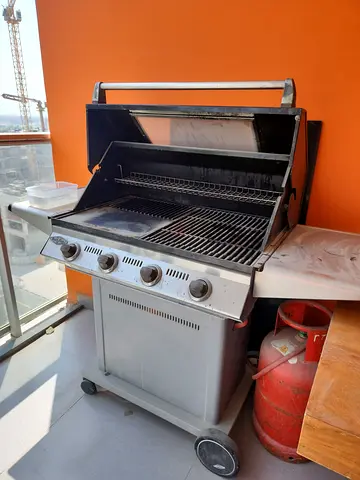 Used 4-Burner Gas BBQ Grill with Hood and Wheels