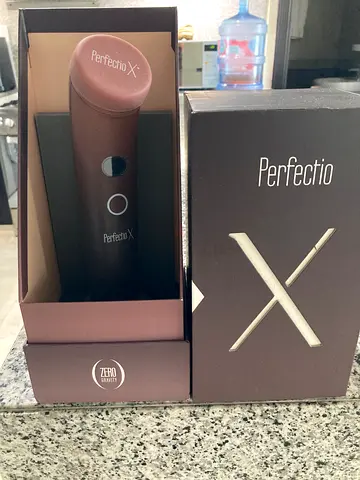 Perferctio X handheld percussion Red Light-lightly used