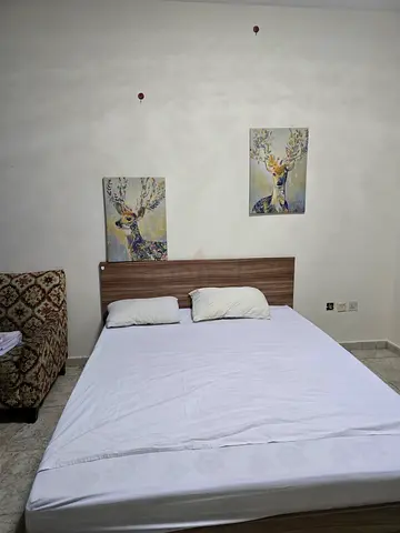 Comfortable Double Bed with Wooden Headboard
