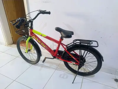 Almost new cycle for children (5 to 11 years) with front basket