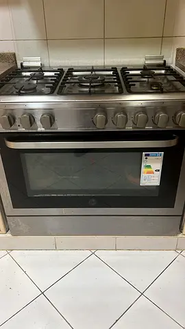 Stainless steel gas oven and stovetop (used)