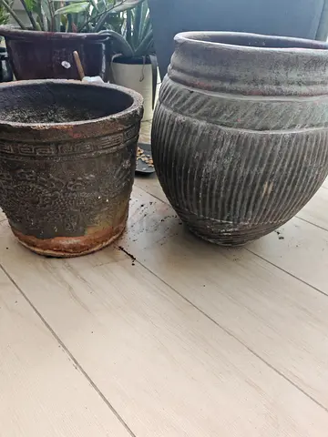 Two heavy pots