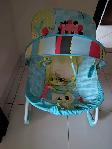 Free Lightweight Baby Bouncer/Rocker with Toy Bar — Good Condition with another baby items