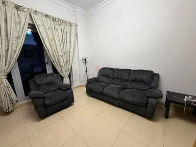 Gray 3+1 seater Reclining Sofa with Matching Recliner - Good Condition