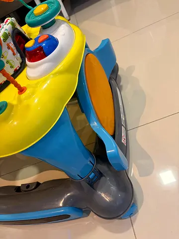 Used baby activity walker with interactive toy trays 3 in 1
