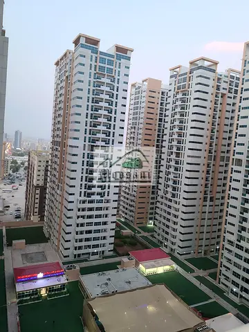 Spacious EMPTY 1BHK GARDEN VIEW With Parking flat available for sale in AED 425,000/ at Ajman one towes, rashidiya 3,ajman
