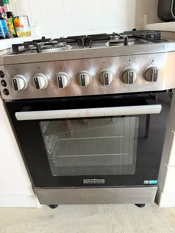 Used Defy Stainless Steel Gas Oven with 4 Burners — Good Working Condition