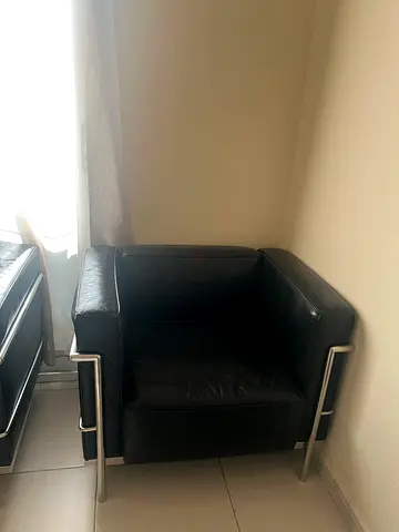 Black leather single armchair with chrome frame - good condition