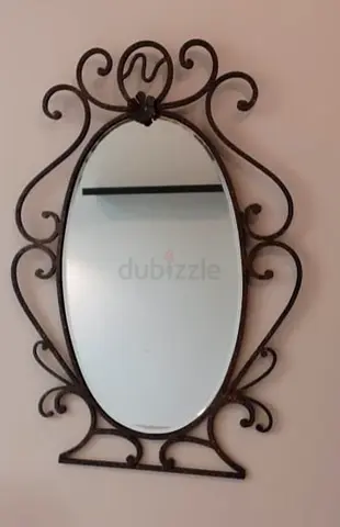 Metal mirror antique. It looks totally new