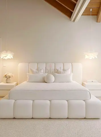 Minimalist White Upholstered Bed with Padded Headboard and Footboard