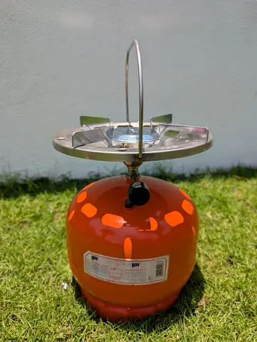 portable 5KG LPG gas storage tank with a hexagonal valve designed for cooking and camping.