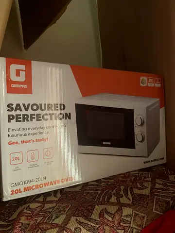 Brand new sealed 20L Geepas Microwave in Box - Compact  Working
