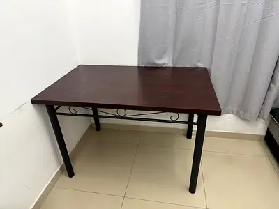 Compact dark wood dining/office table with metal legs