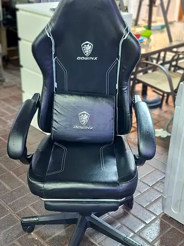 We are selling used Dowinx  gaming chair work from home original lader for sell