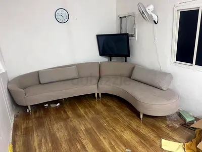 Curved Beige Fabric Corner Sofa - Seats 4-5, Good Condition