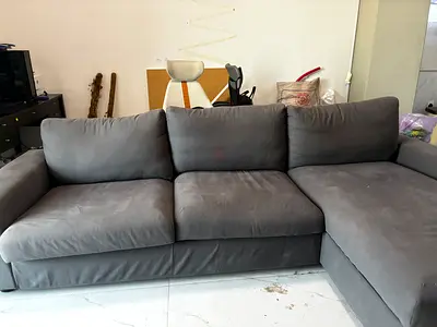 Grey L-shaped 3-seater sofa bed with storage - good condition