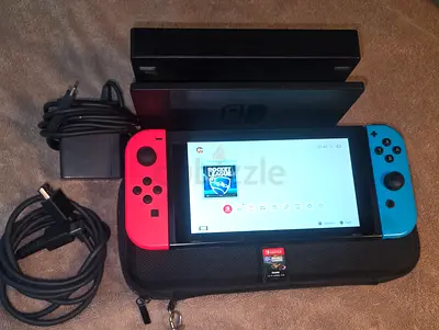 NINTENDO SWITCH +1 GAMES WITH BAG