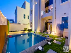 Luxury corner villa for sale in Al Zahia with a private pool and elegant modern design, price includ