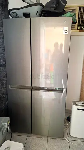 LG Stainless Steel Side-by-Side Refrigerator - Good Working Condition