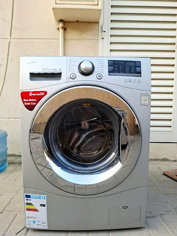 brand LG 9kg, front load fully automatic washing machine,  working perfect