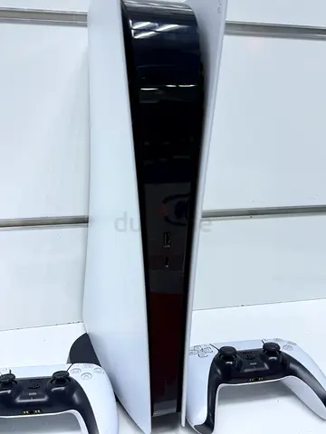 PlayStation 5 Console with Two DualSense Controllers - Good Condition
