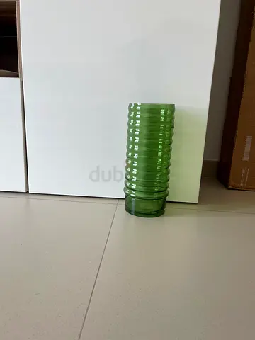 Tall green ribbed glass vase — good condition