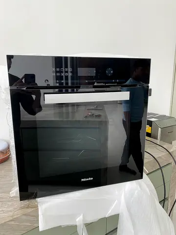 Miele latest model black built-in electric oven 60cm