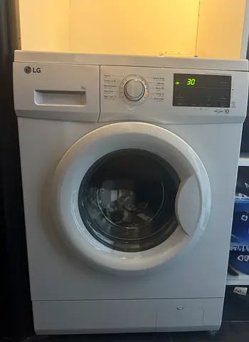 Lg 7 kg front load washing machine - July pickup- Al reef Villas