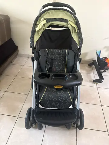 Lightweight double-wheel baby stroller in good condition