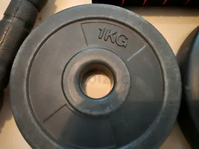Set of 34 kg weight plates (rubber-coated) - good condition