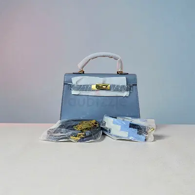 Elegant Blue Leather Top Handle Handbag with Gold Hardware