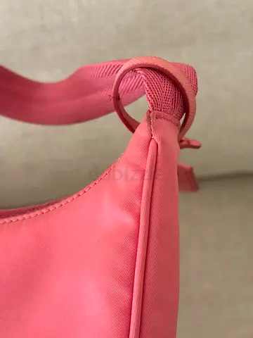 Compact pink shoulder bag — gently used
