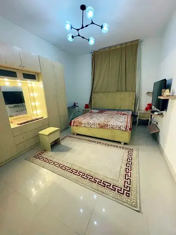 Spacious one-bedroom apartment with living room, fully furnished, in Ajman One Tower, available for