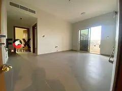 Luxury 2 master bedrooms for annual rent in Al Jurf 3, brand-new building, first tenant, balcony vie