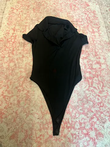 Black short-sleeve womens bodysuit - size medium