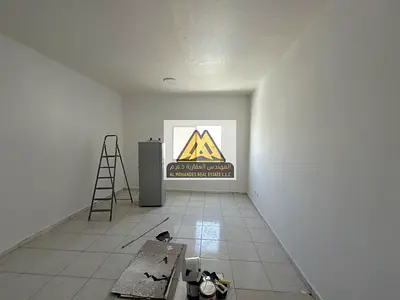 Studio in Al Rashidiya 3, Ajman, large space, semi-open kitchen, built-in wardrobes, central AC, AE