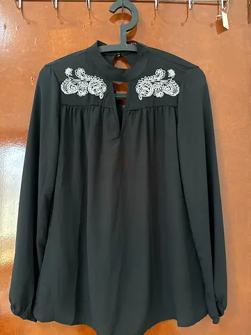 Black long sleeve blouse with white floral embroidery