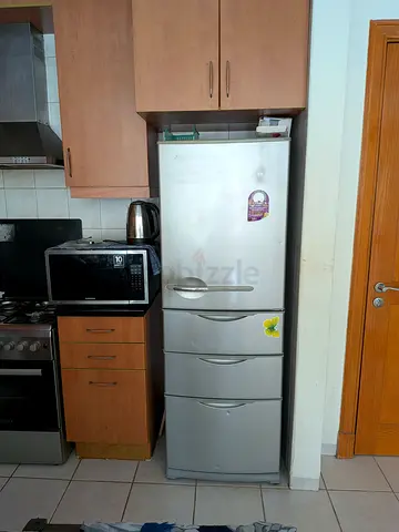 Sanyo Silver 4 cabinet/3-Drawer Refrigerator - Good Working Condition