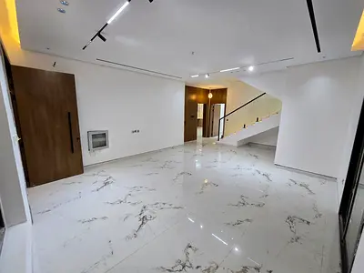 5 master bedrooms, large living room, majlis with washrooms, main kitchen, maid's room, high-end fi