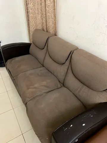 Used 3-seater cushioned fabric sofa with armrests